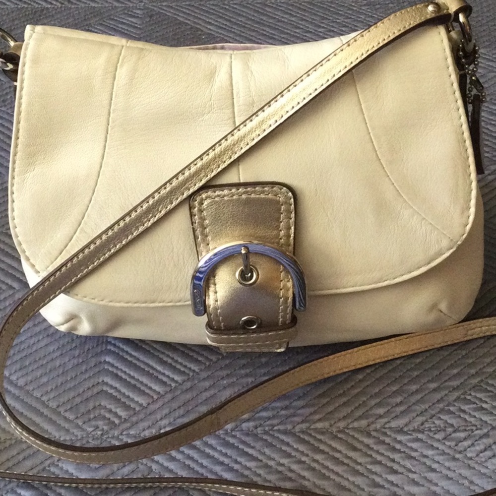 Coach cream leather crossbody bag with silver tone hardware and gold accents - Picture 1 of 7